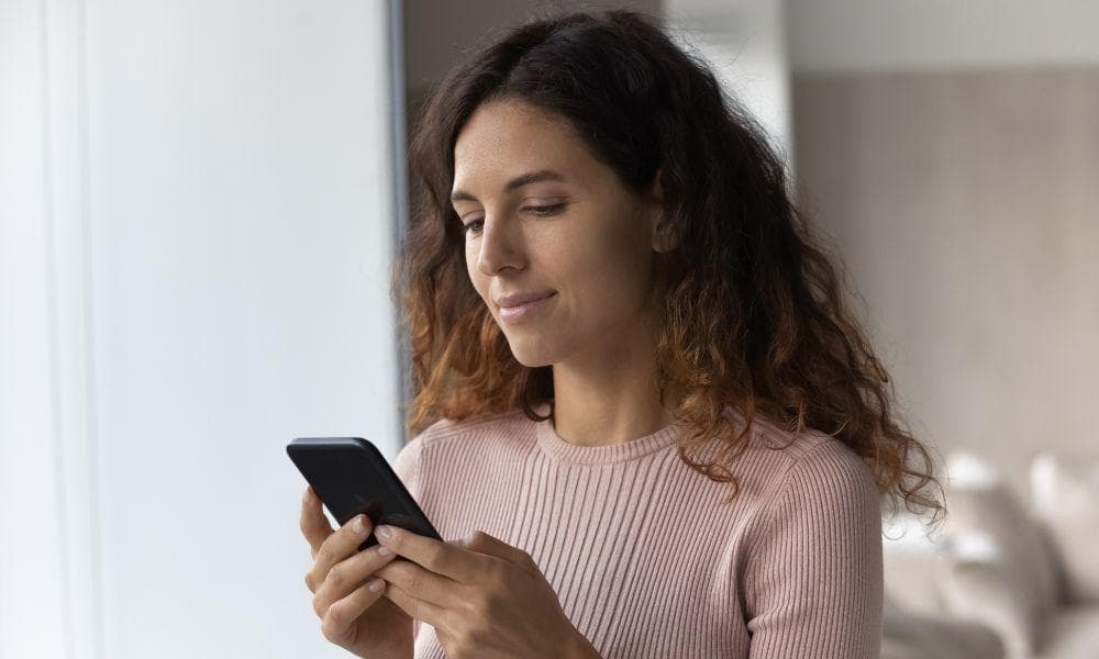 woman checking her cell phone